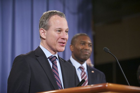 NYS Attorney General Eric Schneiderman Resigns After Assault Accusations NYS Attorney General Eric Schneiderman in 2012. With him is Associate United States Attorney General, Tony West.