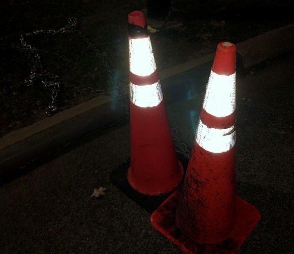Did The Sanctuary Figure a Way to Get Around PSD? Chains removed from Sanctuary parking entrance, cones shifted aside.