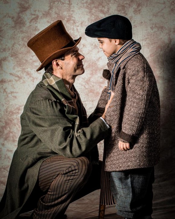 Don't Miss: A Christmas Carol: The Musical, MSTDA, Howe Theatre, Roosevelt Island Russ Cusick as Bob Cratchit with Tiny Tim played by Jack Fadner