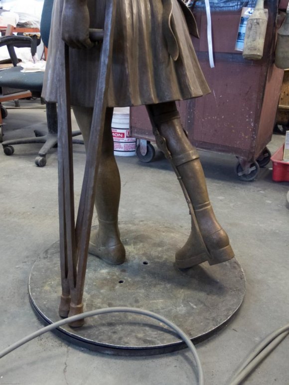 RIOC Steps Up To Give FDR Hope Memorial A Major Boost Toward Completion Detail of the girl's crutches and brace.