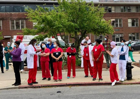 With Vaccine Delivery Imminent, Nursing Homes Must Make a Strong Pitch to Residents Coler Specialty Hospital nursing staff during May salute...