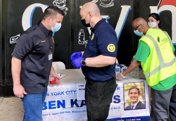Hundreds Get Free Face Coverings In Ben Kallos Organized Giveaway PSD Deputy Chief Anthony Amorosa and RIOC Board Member Michael Shinozaki worked through the distribution event.