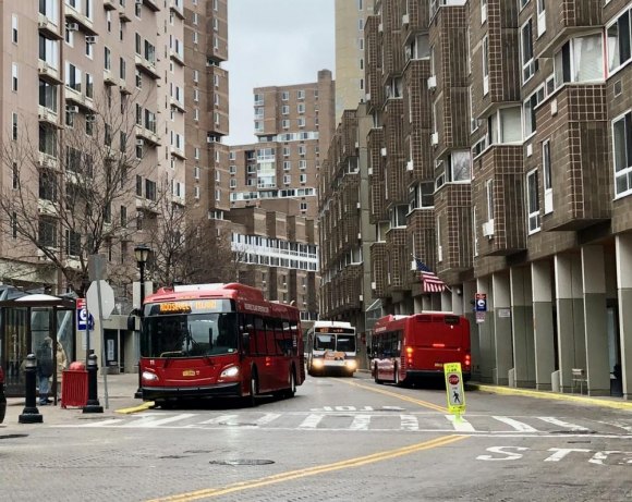 Back to basics... What are we now, Roosevelt Island? Rhythm of the Red Buses, our unique community timepiece...