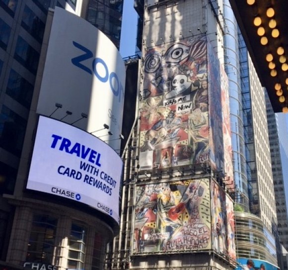 New York's Largest Mural: Jonn Nubian talks with artist Domingo Zapata New York's largest vinyl mural at One Times Square, the work of Domingo Zapata.