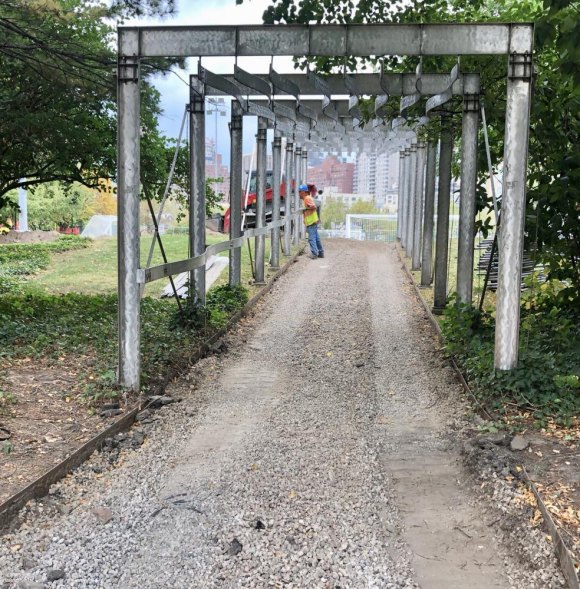 Octagon Field Support Work Shows Progress Badly rutted pavement leading from Main Street to Octagon Field has been removed, awaits fresh asphalt.