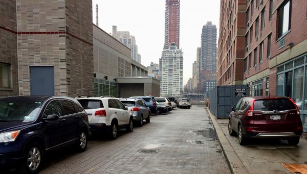 RIOC, Ben Kallos, Gale Brewer Silent As PS/IS 217 Snubs Resident Concerns Cars parked free continue to choke the alley beside PS/IS 217