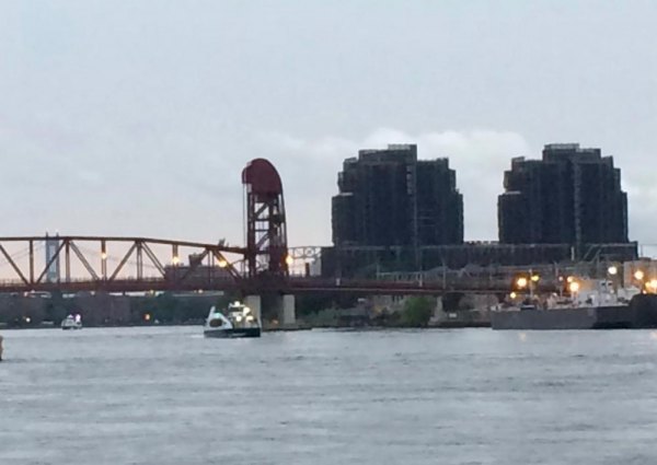At Last, NYC Ferry Welcomes Roosevelt Islanders First ferry approaches beneath the Roosevelt Island Bridge.