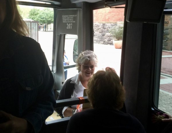 Roosevelt Island Seniors Hit The Road, Thanks To CBN And Anonymous Sponsor CBN/RI Senior Center Director Lisa Fernandez manages bus loading on Roosevelt Island for a Trip to Belmont Park.